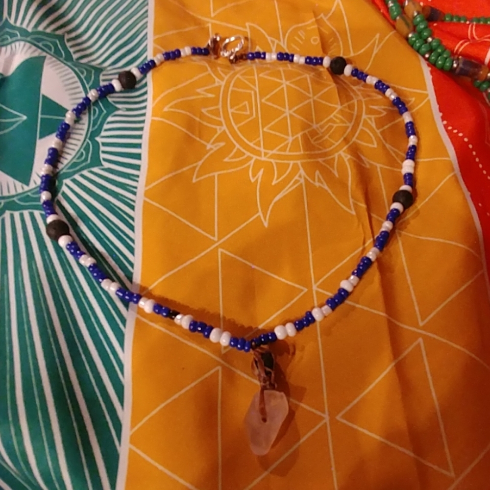 Quartz, glass and lava rock necklace